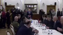 Belarusian Foreign Minister Vladimir Makei makes a statement as Ukrainian Defence Minister Oleksii Reznikov and delegates prepare for talks with Vladimir Medinsky, Russia"s presidential aide and head of delegation, in the Gomel region, Belarus February 28, 2022