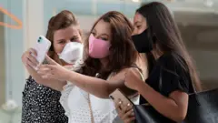 friends taking selfie