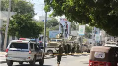 Security forces take security measures at the area after bomb attack during the passage of an African Union Transition Mission in Somalia (ATMIS) convoy in Mogadishu, Somalia on April 03, 2023.