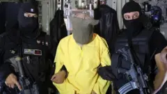 صورة نشرتها قوات الأمن العراقية تظهر سامي جاسم محمد الجبوري، الذي اعتقلته قوات الأمن العراقية، خلال عملية أمنية خاصة.