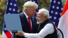 US President Donald Trump and India"s Prime Minister Narendra Modi embrace during a joint news conference after bilateral talks at Hyderabad House in New Delhi, India, February 25, 2020.