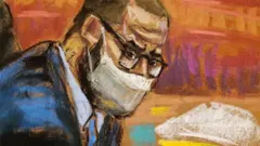 R. Kelly looks towards witnesses in court