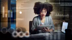 A woman working late in the office