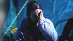 Songul Yucesoy en pleurs