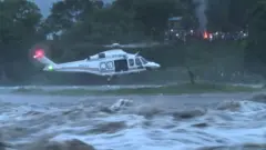 Helicopter rescues stranded fisherman