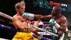 Mayweather and Paul inside ring for dia special match