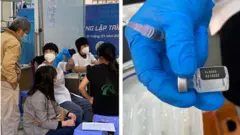 Nhân viên y tế cho phụ huynh học sinh xem số lô và hạn sử dụng vaccine.
