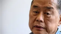 In this photo taken on June 16, 2020, Hong kong pro-democracy media mogul Jimmy Lai, 72, poses during an interview with AFP at the Next Digital offices in Hong Kong. - Lai was arrested under a new national security law on August 10 and police raided his newspaper offices in a deepening crackdown on dissent in the restless Chinese city