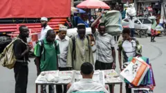 People in Tanzania not social distancing in the street