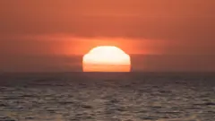 The sun rises in Australia