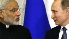મોદીની અને પુતિનની તસવીર