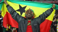 Man with a Ghana flag