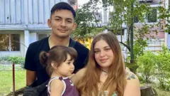 Oriana and Samir with their daughter Chiara