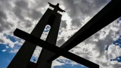 A state of Christ and a cross