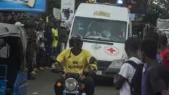 People at the fire site in Sierra Leone, 6 November