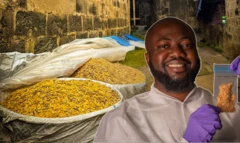 Bag of Egusi wit man wey dey stand dey hold anoda one for hand