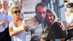 Mulher do motorista de ônibus Philippe Monguillot, Veronique Monguillot (centro) segura pôster com imagem do casal durante passeata em Bayonne, França. Foto: 8 de julho de 2020