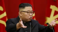 A photo released by North Korea's official KCNA news agency shows North Korean leader Kim Jong-un at a meeting of the Workers Party in Pyongyang. Photo: 18 June 2021
