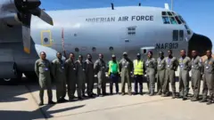 NAF officials around di NAF jet