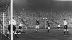 Ferenc Puskas scores Hungary's third goal during the 1953 England-Hungary match
