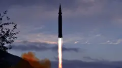 The Hwasong-8 missile firing into the sky in North Korea, according to state media
