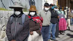Peruvians queue up to receive government aid handouts