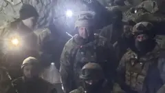 Prigozhin (C) claimed last month to have captured the Ukrainian town of Soledar before Russia's military announced it