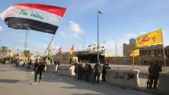 Iraqi security forces guard the US embassy in Baghdad
