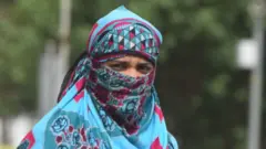 મહિલા