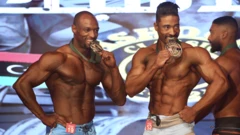 Two bodybuilders at the Ashoor Classic championship in Tripoli, Libya - Saturday 19 March 2022