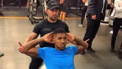 سینا قائمی و آنتونی جاشوا (عکس از آلبوم شخصی قائمی)