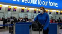 Женщина в лондонском аэропорту