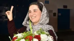 Hajar Raissouni yahakanye gukuramo inda, yasohokanye ibyishimo muri gereza