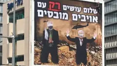 ضجة كبيرة في إسرائيل بسبب لافتات لعابس وهنية وهما يستسلمان