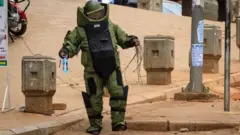 Bomb disposal expert in Uganda