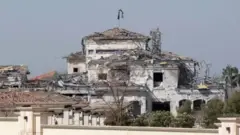 اربیل پر IRGC کے میزائل حملوں سے تباہ ہونے والی عمارت کی تصویر