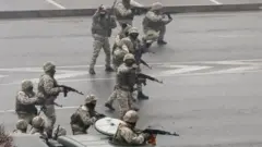 Security forces on the streets of Almaty