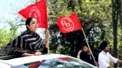 Sonia Mann on a open car