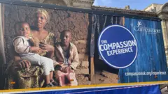 Banner showing a mother and her children