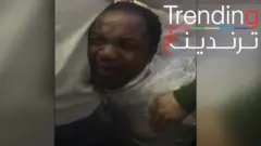 تركيا ترحل رجلا كاميرونيا ملفوفا بشريط بلاستيكي لاصق