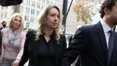 Holmes seen arriving to court on Friday