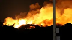Shuri Castle is engulfed in flames in Naha, Okinawa prefecture, southern Japan on early October 31, 2019.
