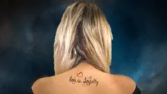 Hollie with her previous tattoo