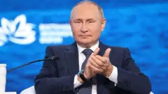 Путін