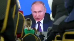 Путин