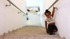 Unwana ari mu bwishisho muri Ashkelon, mu bumanuko bwa Israel