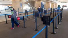 Travelers have no wait going through a TSA security checkpoint at John Wayne Airport in Santa Ana