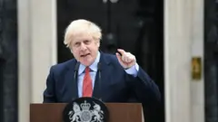 Prime Minister Boris Johnson makes a statement outside 10 Downing Street, London, as he resumes working after spending two weeks recovering from Covid-19