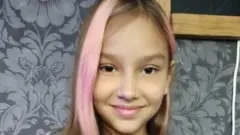 Polina was with her family when their car came under fire