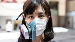 Alice Cheung in two masks